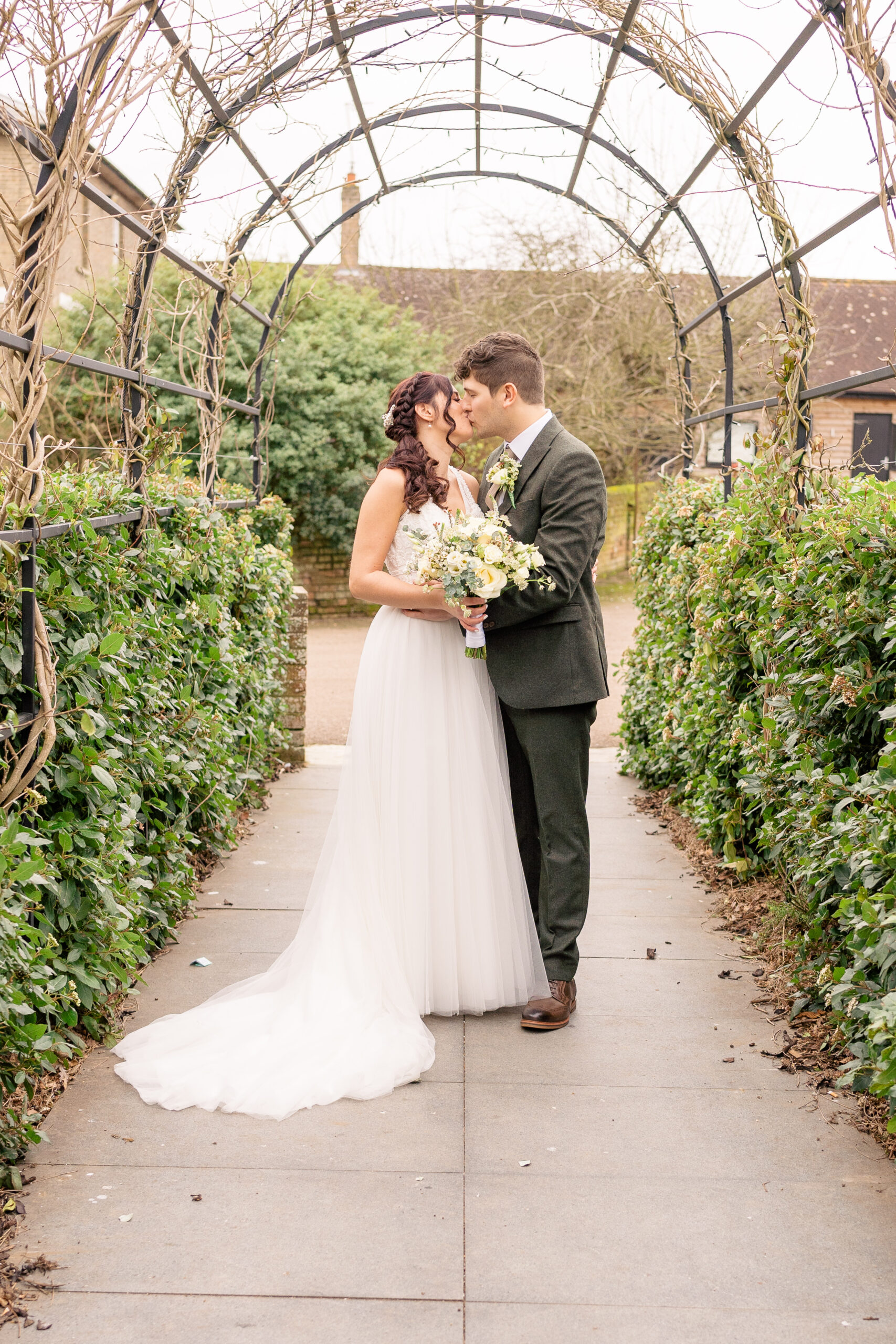 Bride and groom kiss